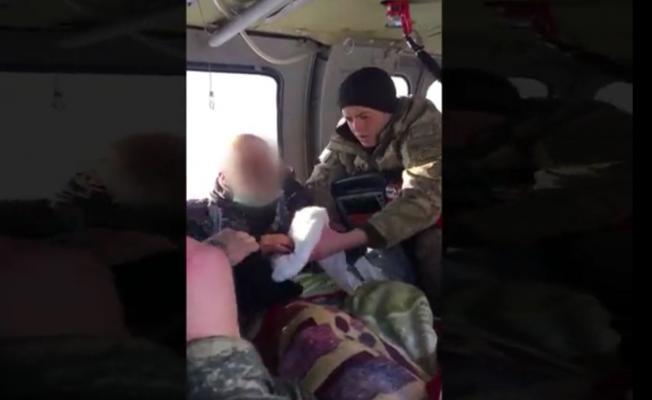 Askeri helikopter kolunu yem makinesine kaptıran besici için havalandı - Videolu Haber 